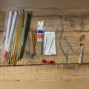 Variety of vintage and newer knitting crochet needles and hooks and accessories